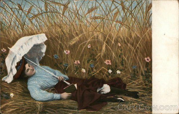 Woman Laying Amid Tall Grass Reading Book, Holding Parasol