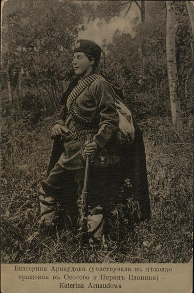 Katerina Arnaudowa - Soldier Holding Rife, Wearing Bullet Belts, Outdoors Near Trees