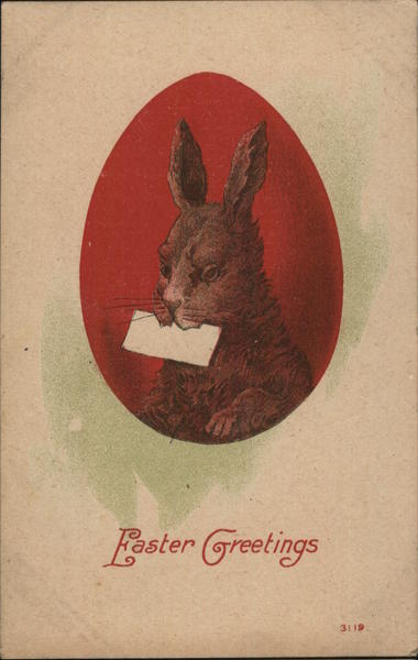 A bunny holding a letter painted on a red Easter egg