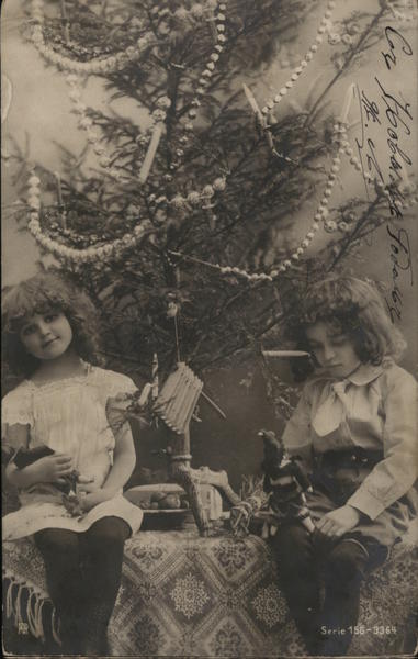 Girls with Dolls & Christmas Tree Children