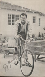 Gig Young on Bicycle Gig Young on Bicycle