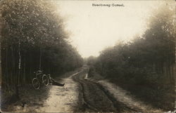Man and Bike by Side of Road, 1917 Postcard