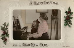 Christmas: Girl and Woman Singing at piano Postcard