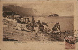 Women singing as they wash Women singing as they wash