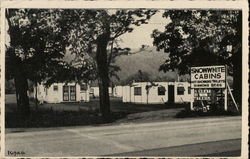 Snow White Cabins Postcard