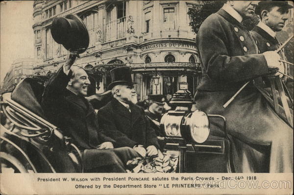 President W. Wilson with President Poincare salutes the Paris Crowds