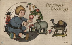 Boy with Christmas Toys Postcard Postcard