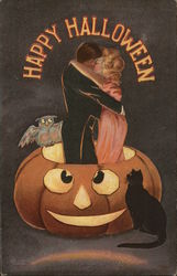 Happy Halloween - couple kissing inside a Jack-O-Lantern Postcard