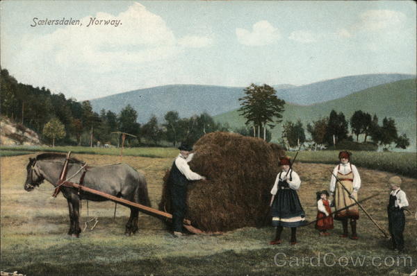 Farming family with bale of hay Saelersdalen Norway