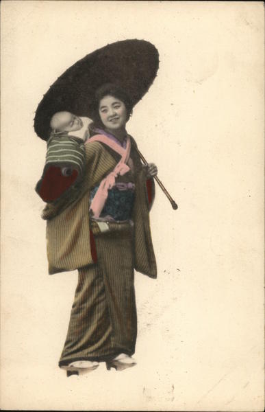 Japanese woman with parasol and baby