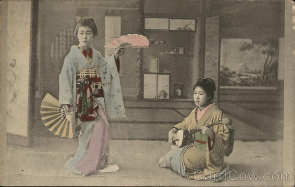 Japanese geishas performing