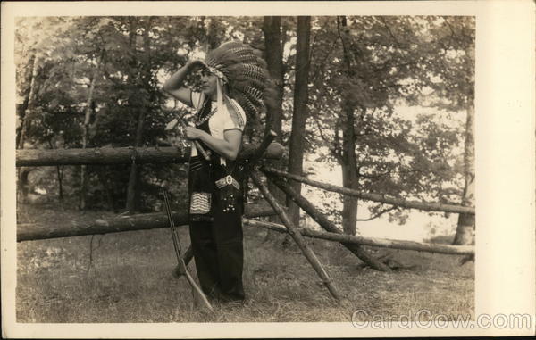 Man in Indian Garb and Rifle Native Americana