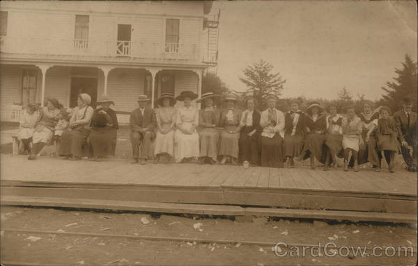 Group of People Waiting at Train Station Depots