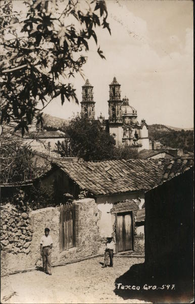Man Standing Outside Stone Wall Taxco Mexico