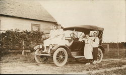 Family Posing on Car Postcard