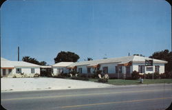 The Glass Door Motel and Apartments Postcard