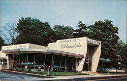 Raymond. P. Scott Oldsmobile Rambler Postcard