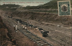 Men drilling poles for blasting, Culebra cut, Canal Zone Postcard