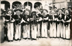 Group of Masked Men - One With Guitar Postcard