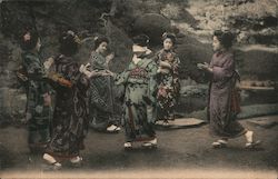Japanese girls playing game. Postcard