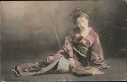 A lady relaxing Postcard
