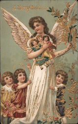 An angel holding dolls with children: "A Merry Christmas" Postcard
