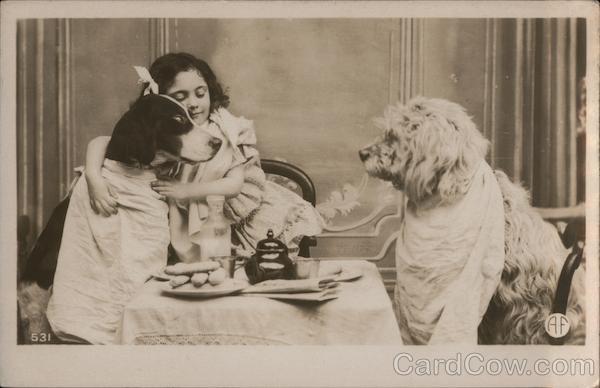Girl Having Tea With Her Dogs