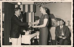 Man Receiving Award Postcard