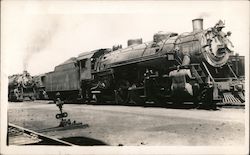Locomotive in Train Yard Postcard