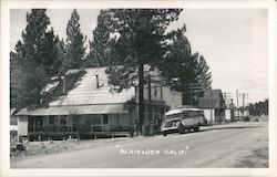 Bus Stop in Town Postcard