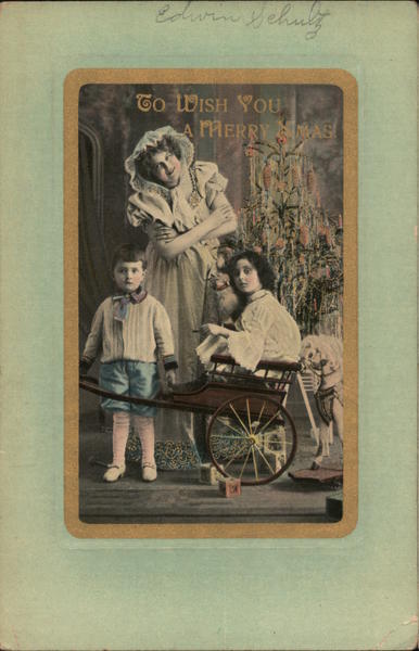 To Wish you a Merry Xmas! - Three Kids Posing In and Behind a Wagon