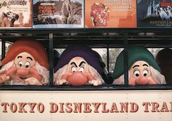 Tokyo Disney The Seven Dwarfs Enjoy a Ride on the Omnibus Postcard