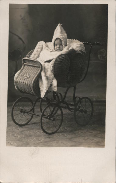 Baby in Wicker Carriage Babies