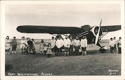Native Alaskans Posing With a Small Plane Fort Wainwright, AK Postcard Postcard Postcard
