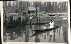 Woman in Canoe Postcard
