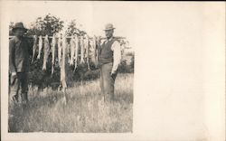 Men with Their Catch Postcard