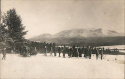 People Tobagganing on Field Postcard
