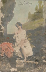 Woman Undressing in Field Postcard