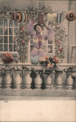 Woman Putting Up Paper Lanterns Postcard