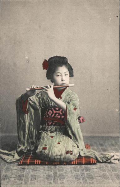 A Geisha lady with a flute Japan