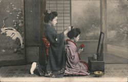 Japanese women fixing hair Postcard