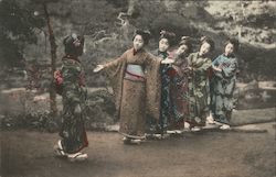 Young girls dressed in kimono, dancing Postcard