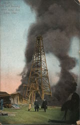 Oil well burning after being shot Postcard