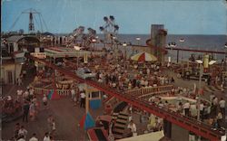 Funtown USA - A colorful evening view of Fantasy Land on the Boardwalk Seaside Park, NJ Postcard Postcard Postcard