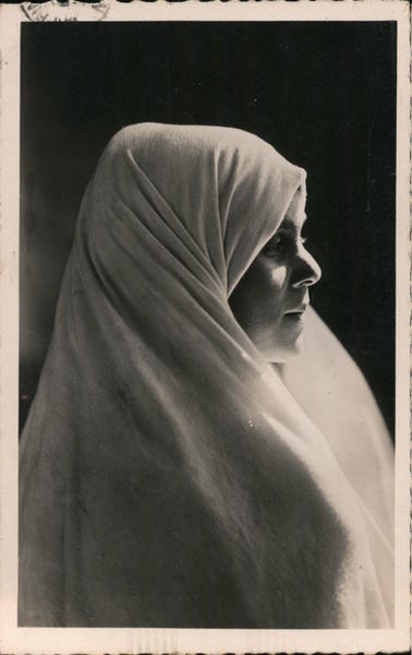 A Woman Wearing a Hair Cover Arab