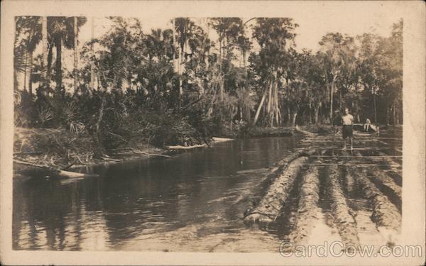 Man on Log Raft in River Florida