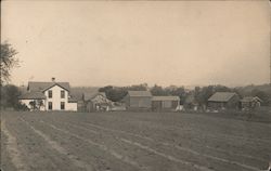Farm From Across Plowed Field Postcard