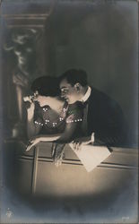 A Man Standing Next to a Woman Looking Through Binoculars Postcard