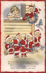 A Bunch of Little Kids in Christmas Clothes Postcard