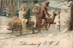 An Angel Holding a Christmas Tree Being Pulled on a Sled Postcard